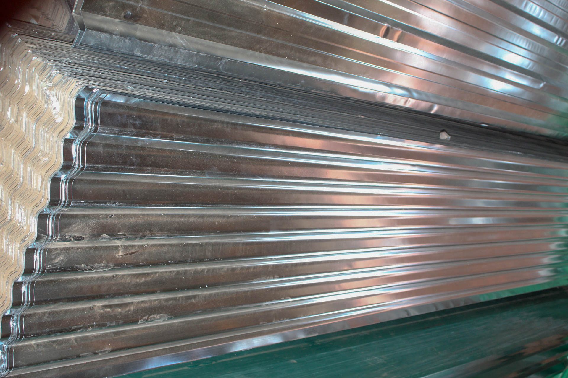 corrugated sheets at RoofMax workshop.